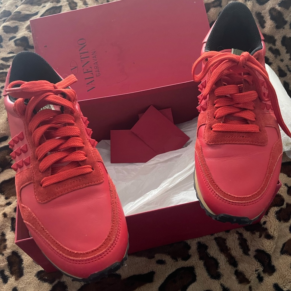 Red orange colored rock stud Valentino Woman’s sneakers size 38.